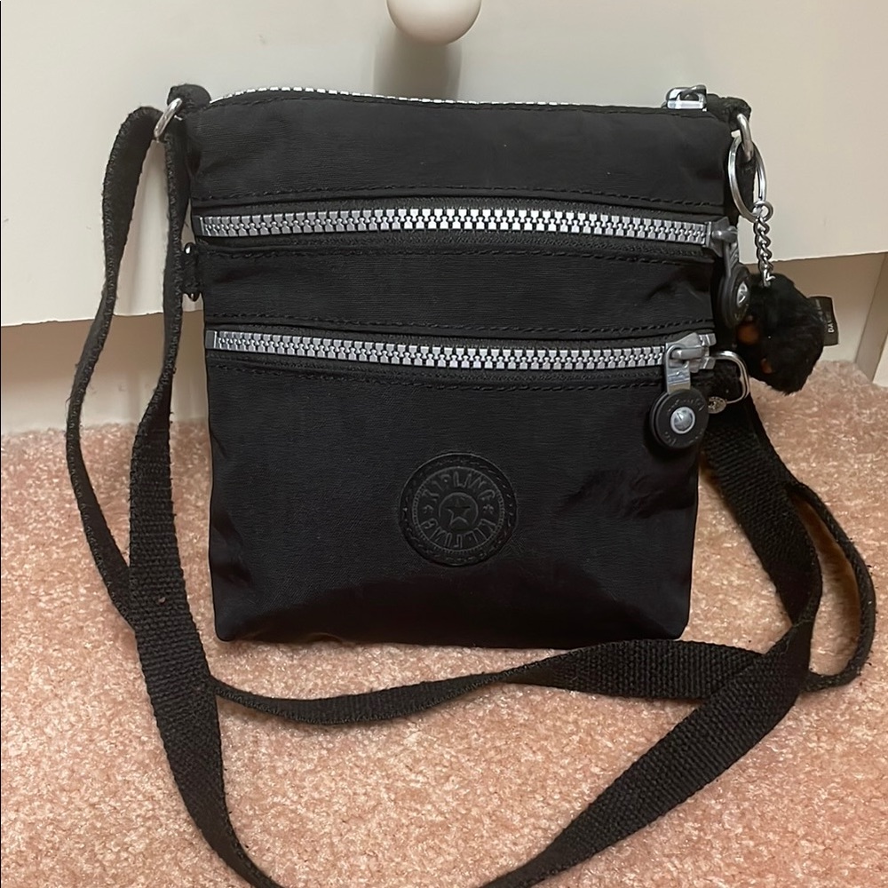 Kipling Black Messenger Bag with Silver Accents